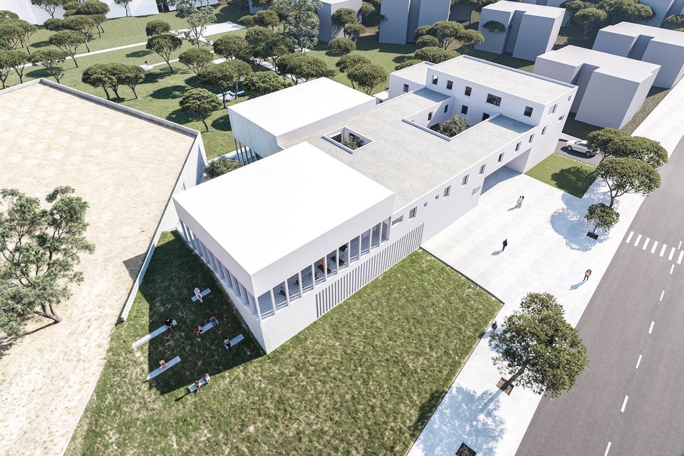 Bodrum Hidroterapi Merkezi kuş bakışı: beyaz bloklar, avlular ve çamlar