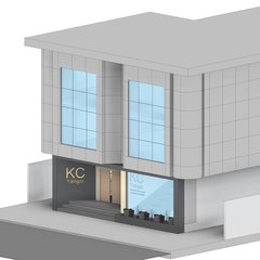 Binanın aksonometrisi: zemin katta KC Yangın showroomu, üstte mevcut binanın panel kaplı katı