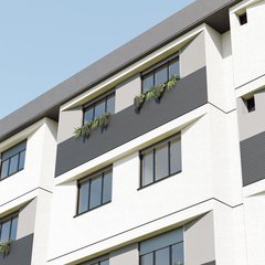Alt açıdan cephe: üst üste dizilen beyaz çerçeveler, geniş pencereler, antrasit balkon panelleri ve koyu saçak