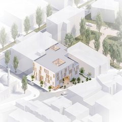 Havadan görünüş: tarihi doku içinde, ortasında avlu boşluğu bulunan beyaz kütle ve Kurşunlu Camii