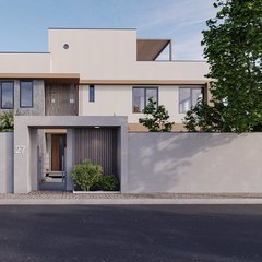 Sokaktan bakış: beton bahçe duvarı, 27 numaralı giriş nişi ve düşey ahşap lambri; arkada beyaz sıvalı, bej şeritli iki katlı kütle ve gri taş kaplama